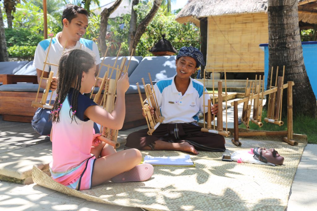 Girl Playing Angklung